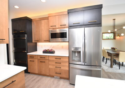 Modern Kitchen - View of fridge, counter, and dining from middle of kitchen