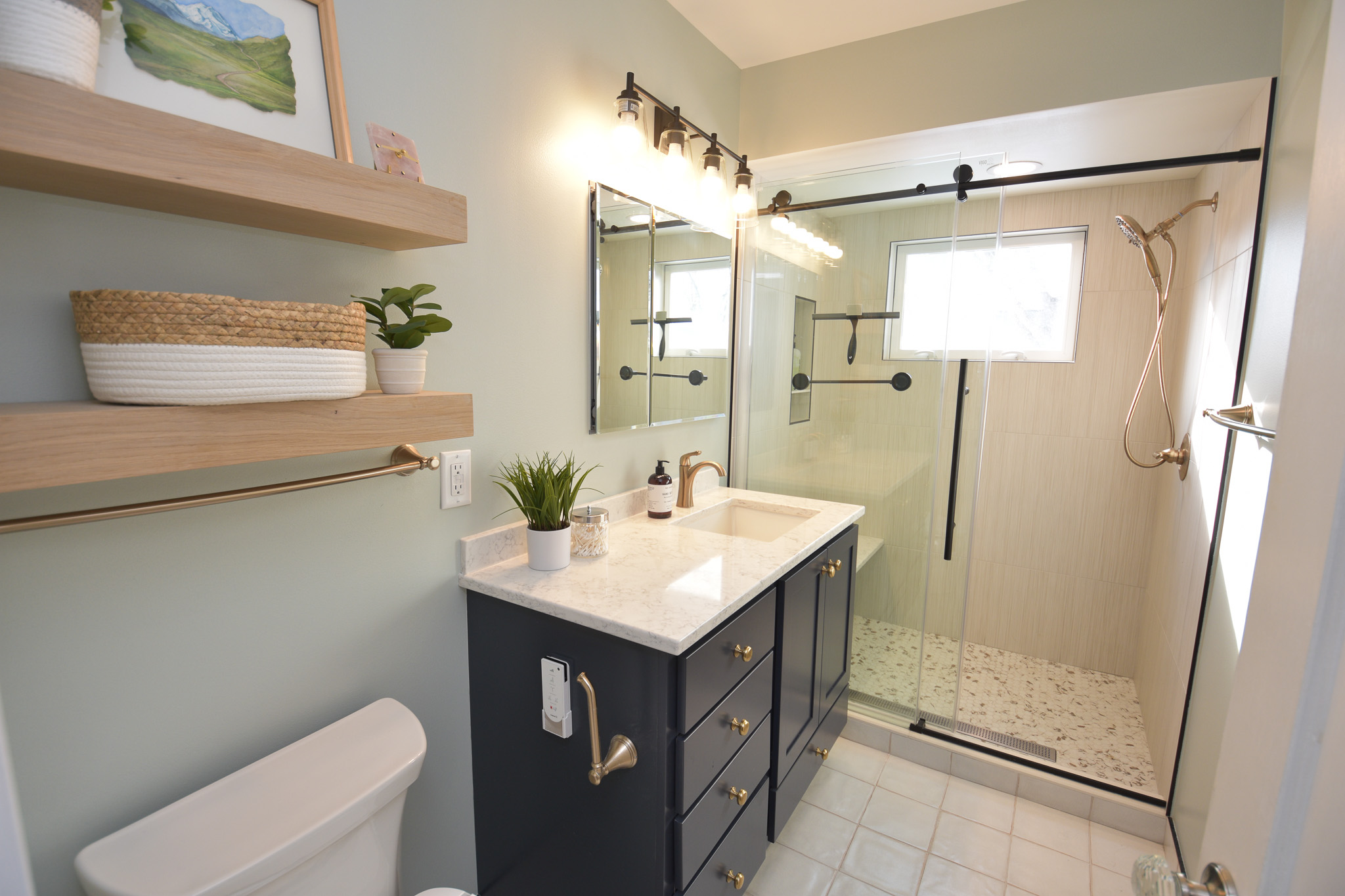 Bathroom remodel - toilet, vanity, mirror, lighting, glass door shower