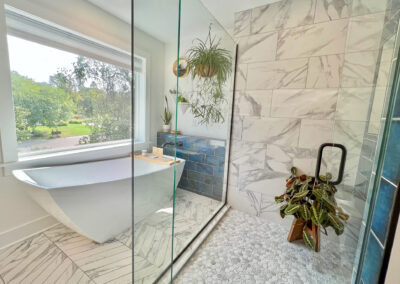 View of tub from glassed in shower