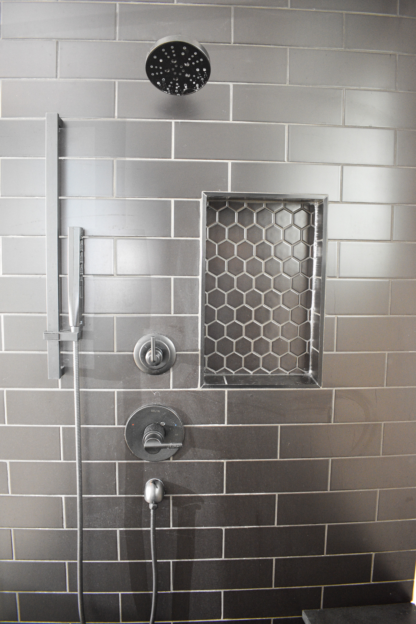 Contemporary Living - Master Bath - Double Shower - Black Tile close up shot