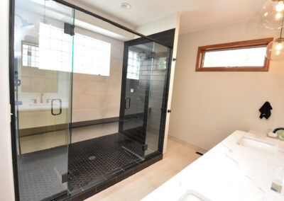 Modern Living - Master Bath - Double Shower - Black Tile - Double Vanity